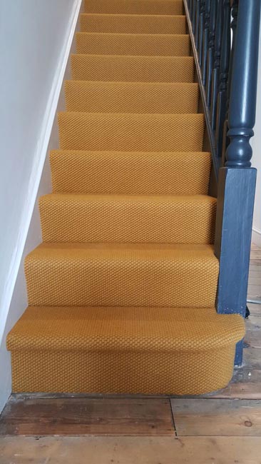 portfolio-carpets-orange-beige-stair-close-covered-fitting-02