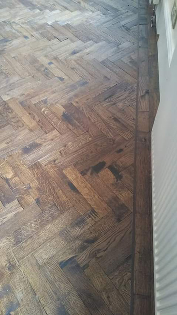 portfolio-hardwood-floors-herringbone-wood-in-bedroom-03