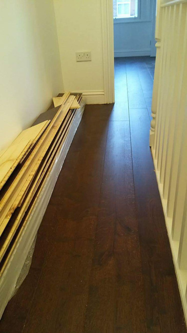 portfolio-straight-plank-wood-installation-into-bedroom-and-hall-02