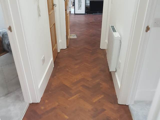 Amtico Herringbone Flooring to Hallway in Chalk Farm