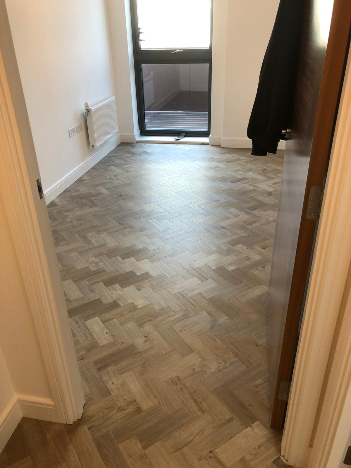 To supply & install Amtico Spacia Sun Bleached Oak luxury vinyl flooring in Kilburn 2