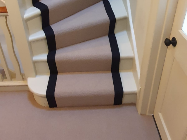 Pink Carpet with Black Binding In Kensington