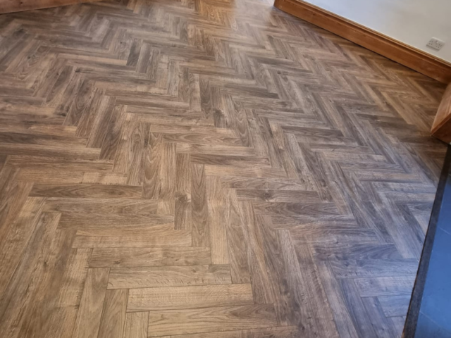 Xylo Urban Herringbone San Francisco Java Brown Laminate Flooring