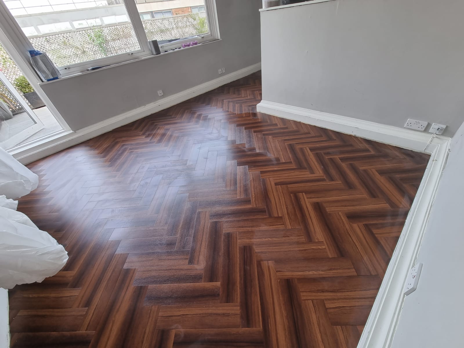 Amtico Signature Rosewood Tick Finnish in Herringbone Installation 5