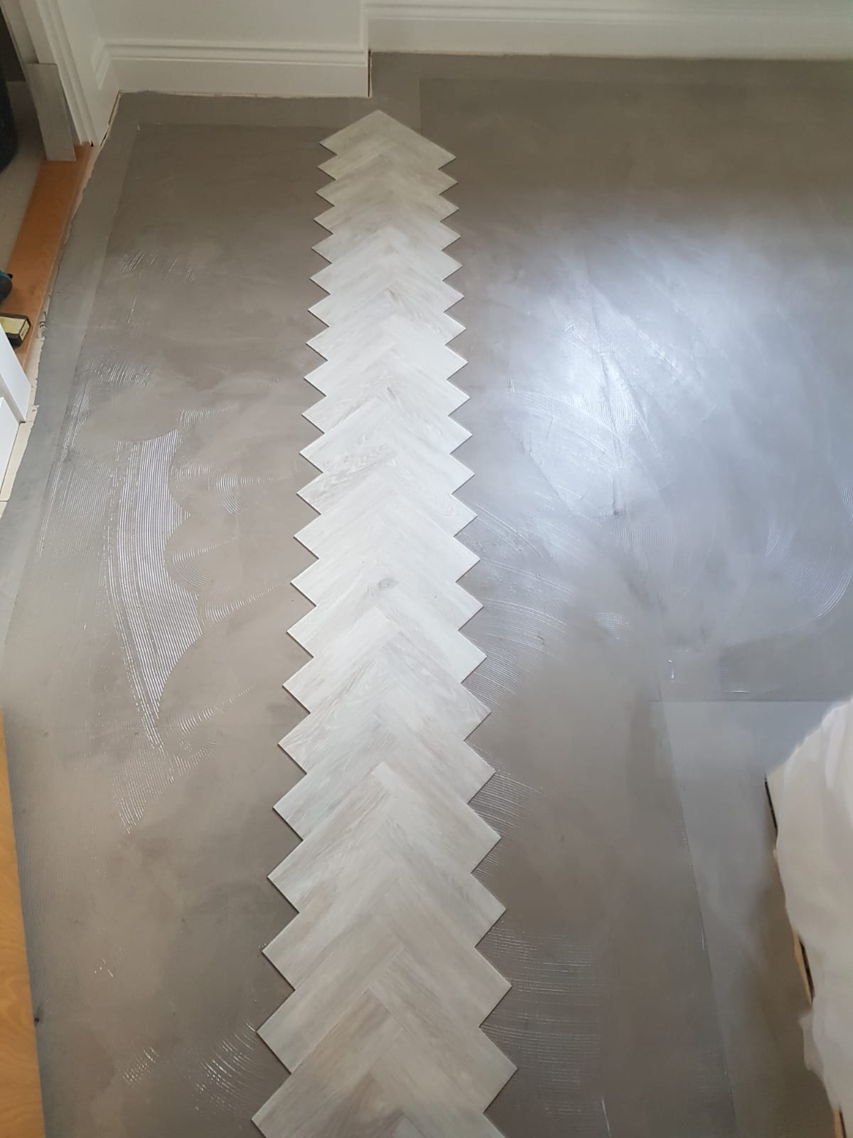 Amtico Signature White Washed Wood fitting in-0