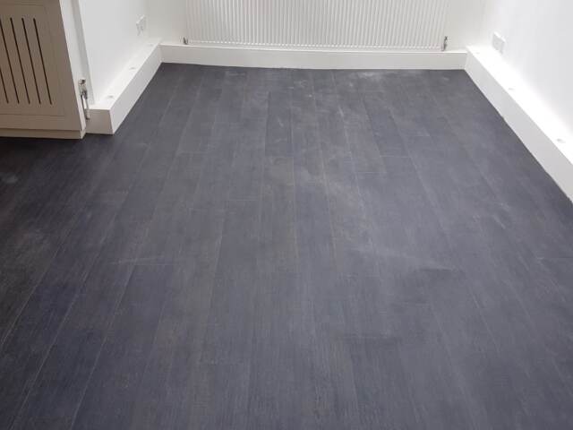 Amtico Spacia Scorched Timber Instalment In Canary Wharf