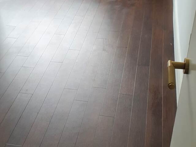 Amtico Spacia Black Walnut installation in Ealing