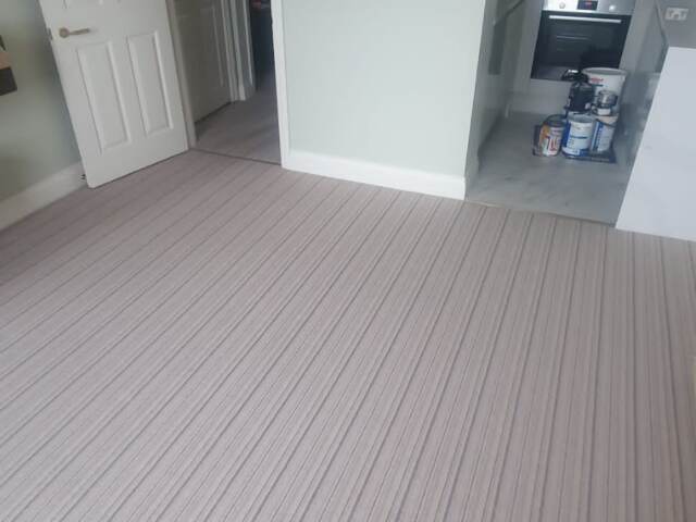 Hugh Mackay Carpets Deco Stripe Mayfair installation in Westminster