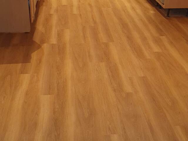 Amtico Spacia Honey Oak fitting in Southwark