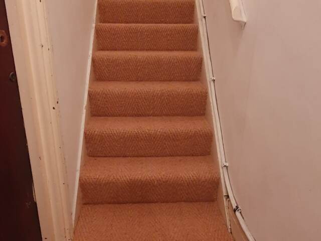 Crucial Trading Coir Herringbone Natural carpet installation in Kilburn