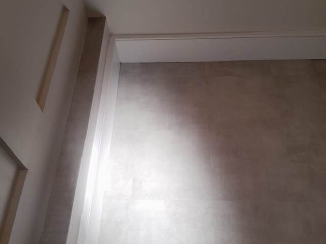 Amtico Signature Stucco Sage installation in Camden