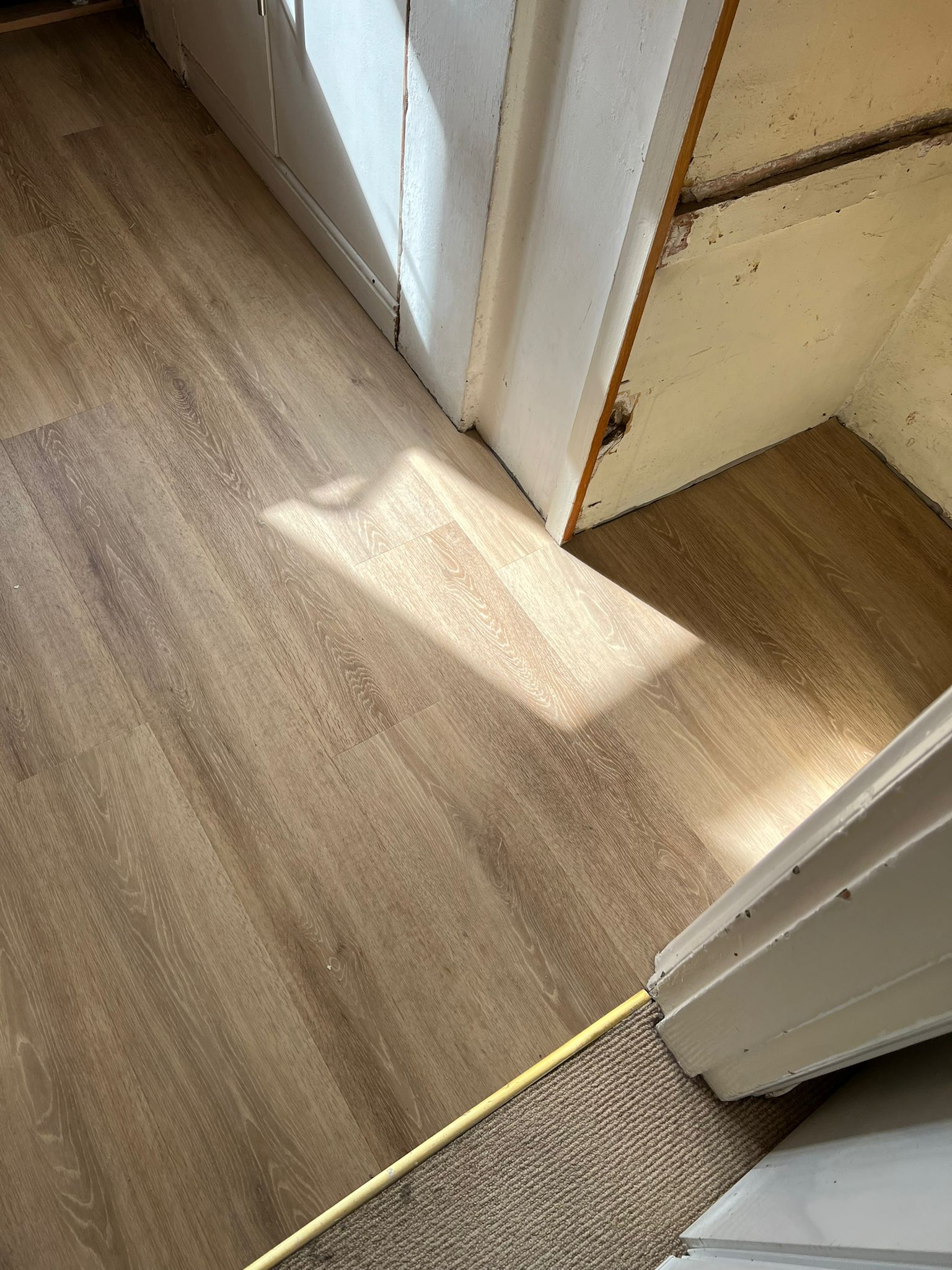 Amtico Spacia Muted Oak fitting in Chiswick-1
