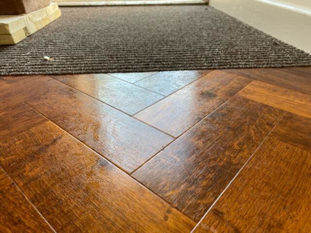 Amtico Signature Priory Oak herringbone installation in Barnes