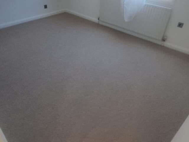 Kersaint Cobb Studio Craft Woven Tone carpet installation in Earls Court