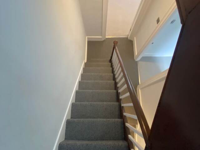Hugh Mackay Carpets Deco Stripe Bermondsey installation in Pimlico