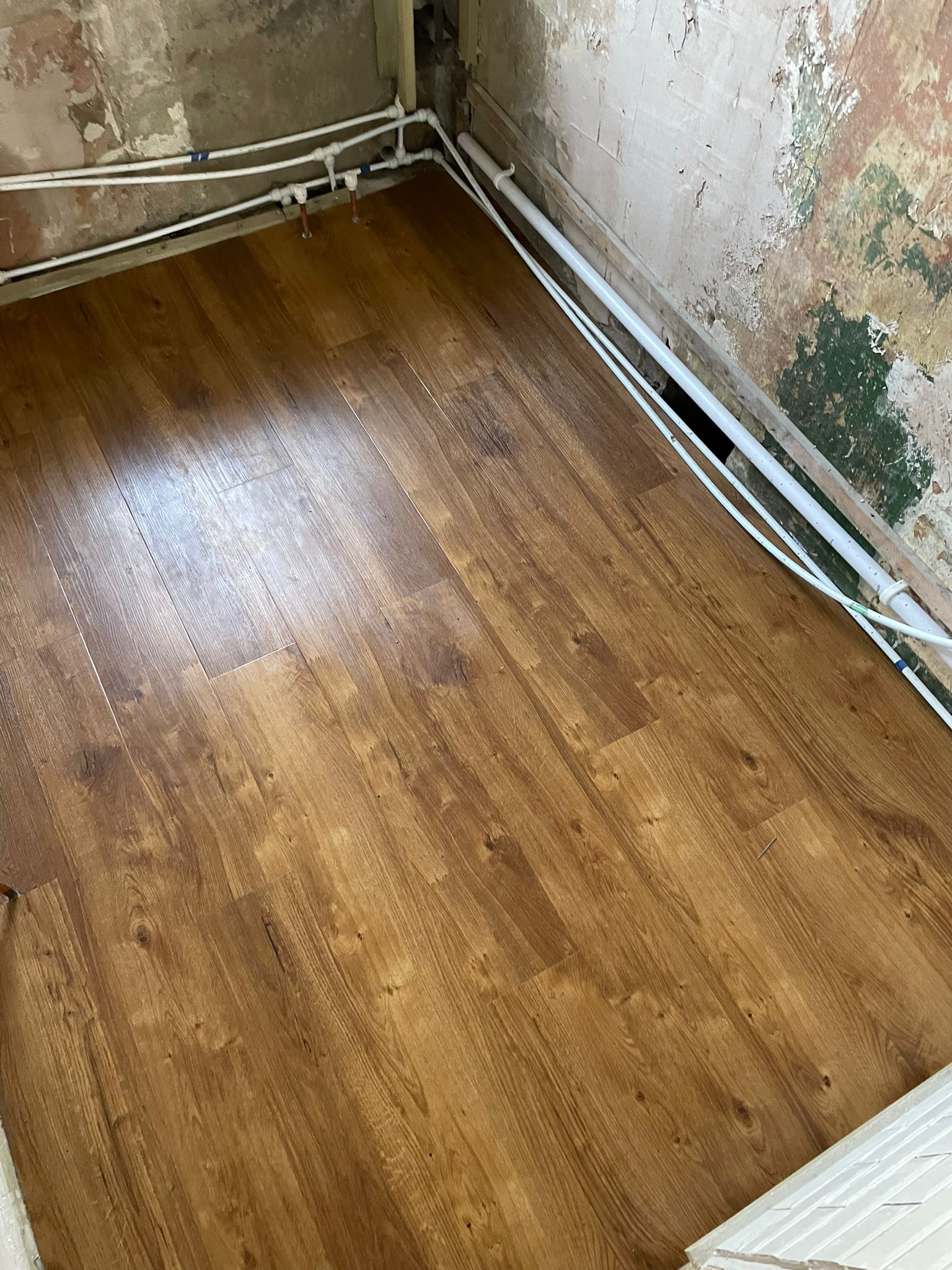 Amtico Spacia Royal Oak installation in Kilburn-1