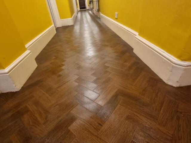 Amtico Spacia Black Walnut installation in Ealing