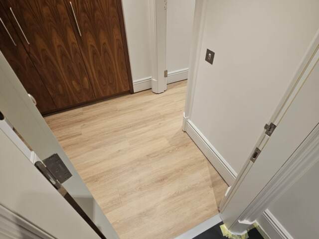 Amtico Spacia Muted Oak fitting in Lambeth