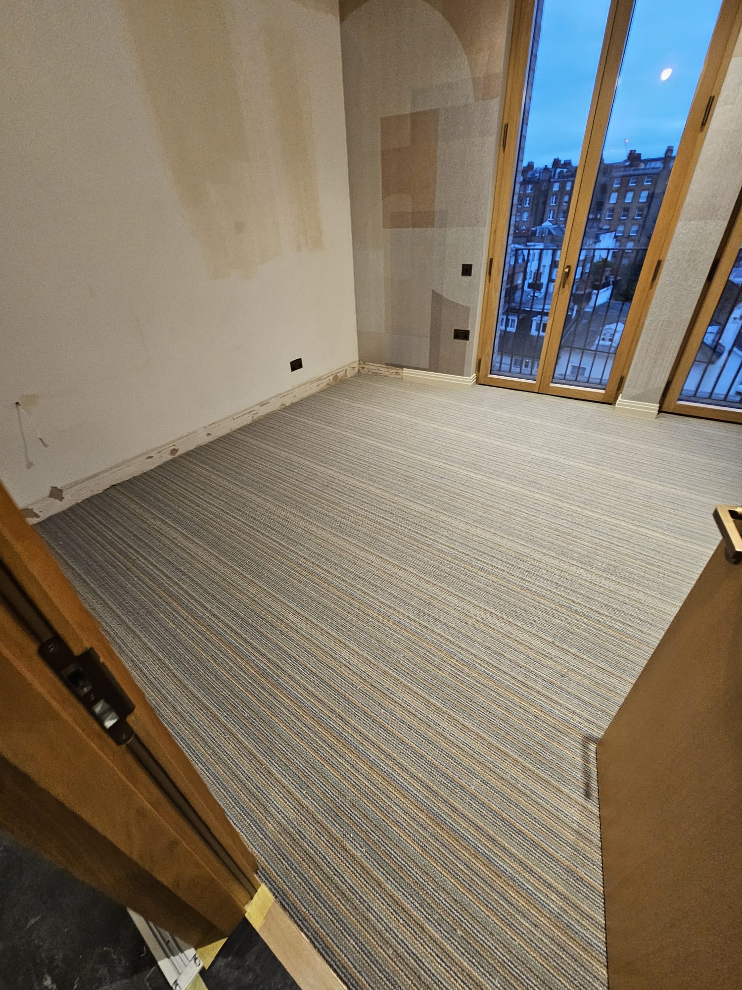 Elements London Africa Macaw carpet installation in Richmond-0