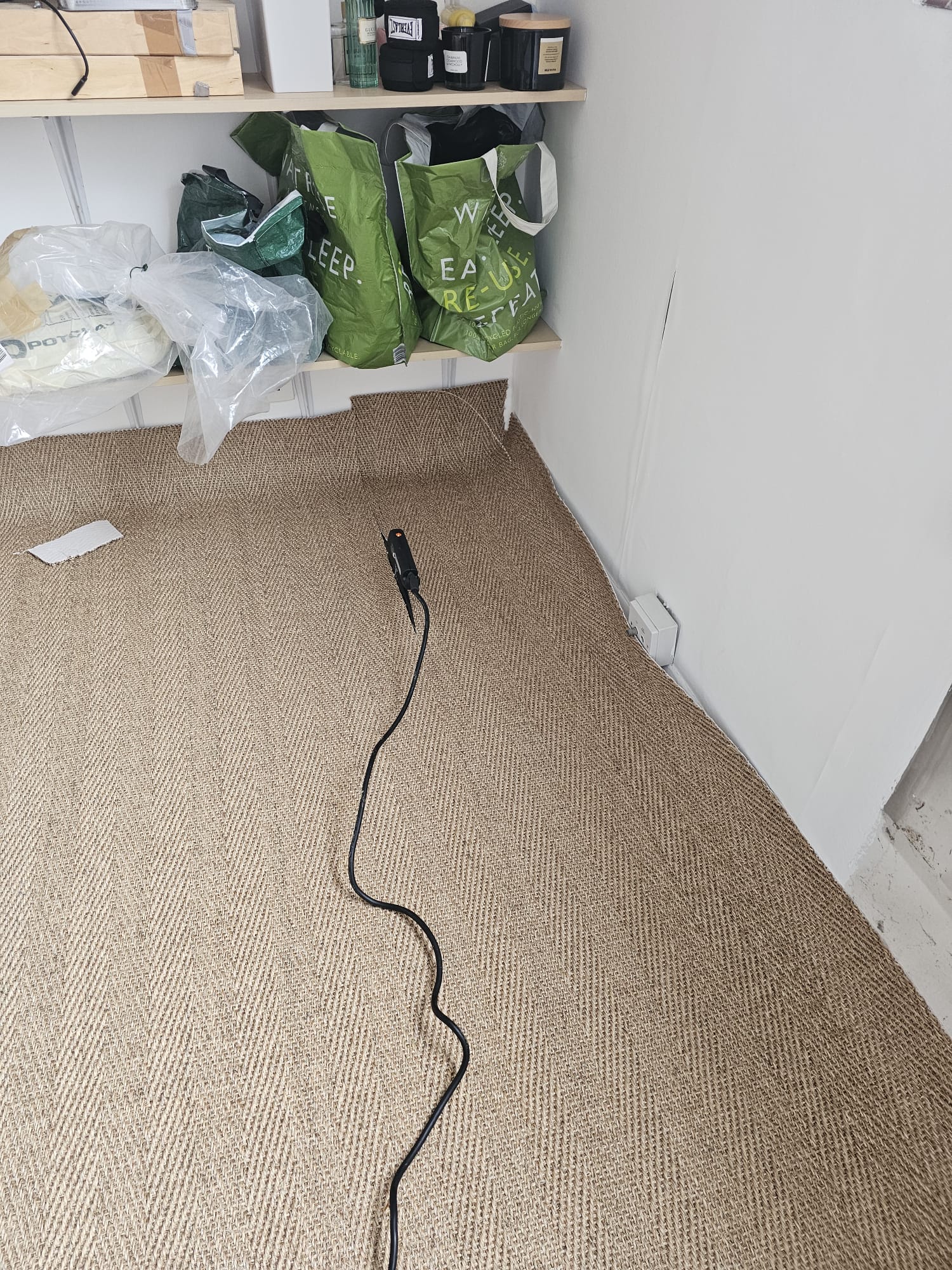 Kersaint Cobb Sisal Herringbone Copper carpet installation in Battersea-1