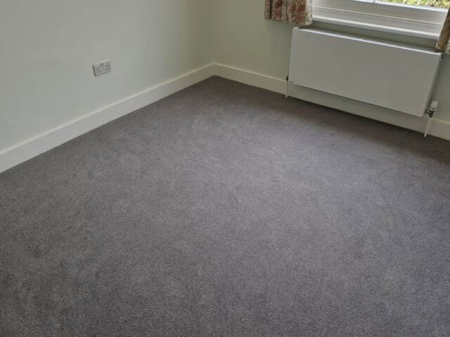 Hugh Mackay Carpets Durham Twist Silver Satin installation in Canary Wharf