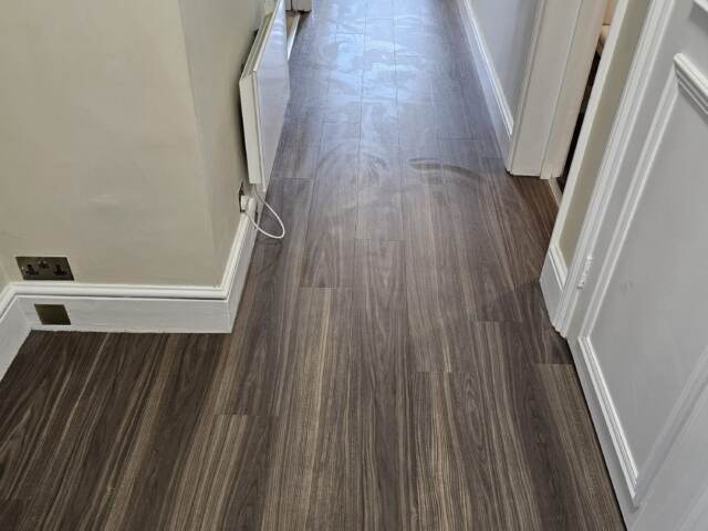 Amtico Spacia Blackened Spa Wood installation in Lambeth