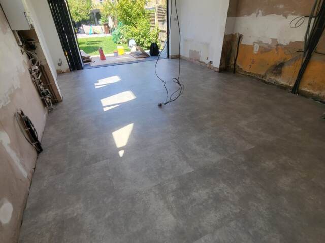 Amtico Spacia Monument Concrete installation in Shepherds Bush