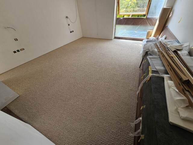 Crucial Trading Snug Soft Sand carpet installation in Acton