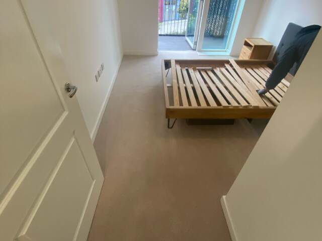 Brockway Carpets Dimensions Plain Pale Stone installation in Hammersmith