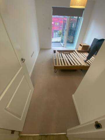 Brockway Carpets Dimensions Plain Pale Stone installation in-Main (1)