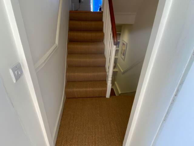 Kersaint Cobb Sisal Tigers Eye Amber carpet installation in Earls Court