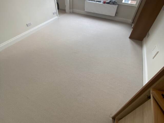 Unnatural Flooring New England Coppers Town carpet installation in Kilburn