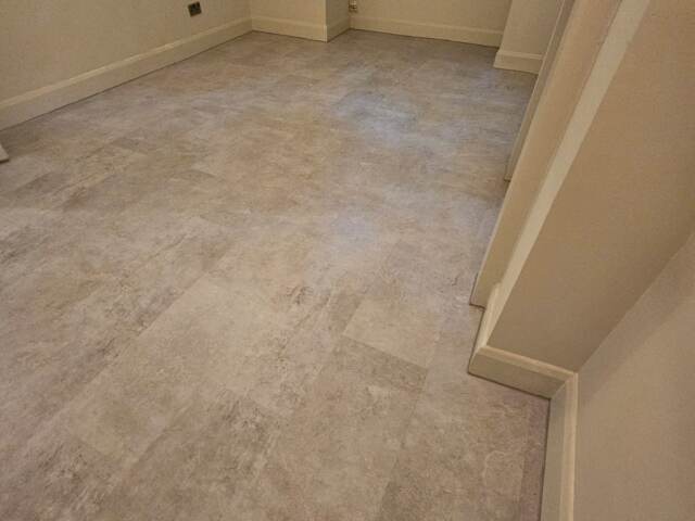 Polyflor Camaro Soho Cement 2347 installation in Docklands