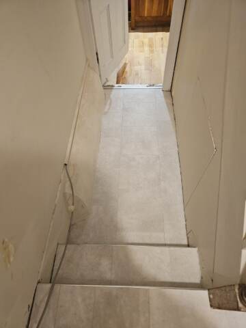 Amtico signature waterloo concrete installation in hackney