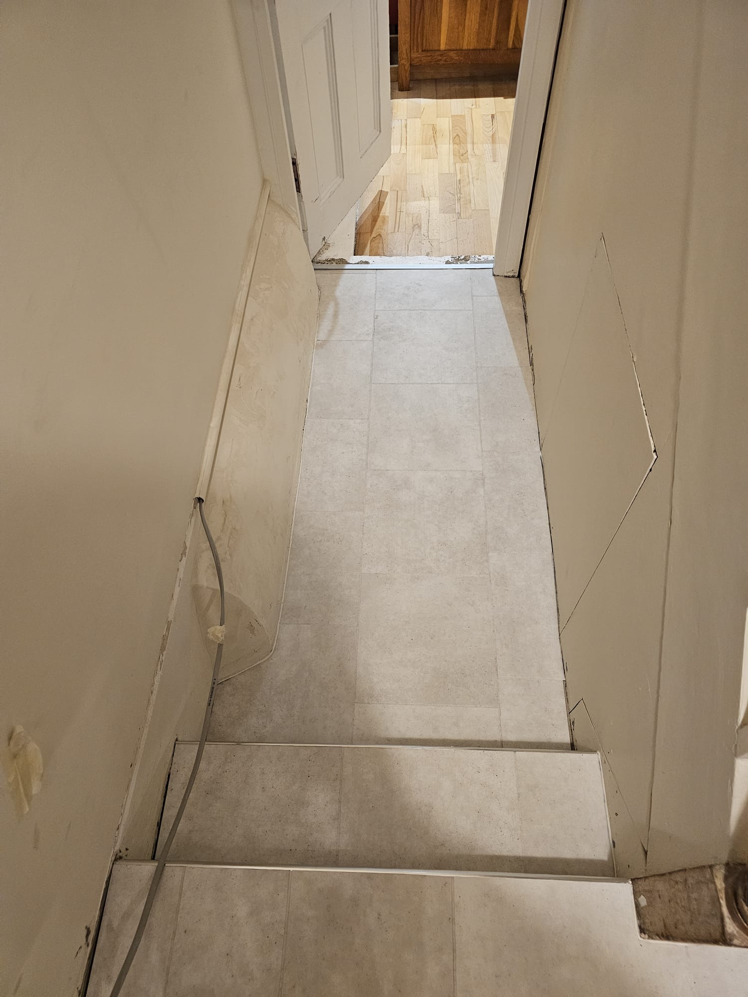 Amtico signature waterloo concrete installation in hackney