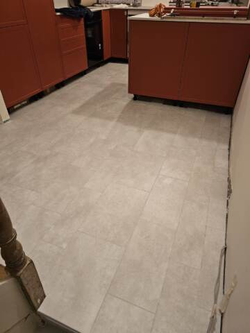 Amtico signature waterloo concrete installation in hackney