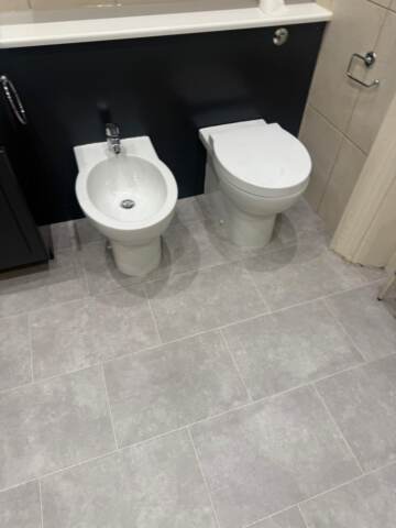 Amtico spacia plaza concrete installation in Kensington