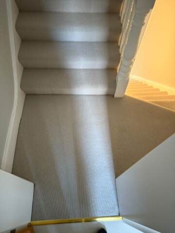 Crucial trading weather watching dawn light carpet installation in Hackney