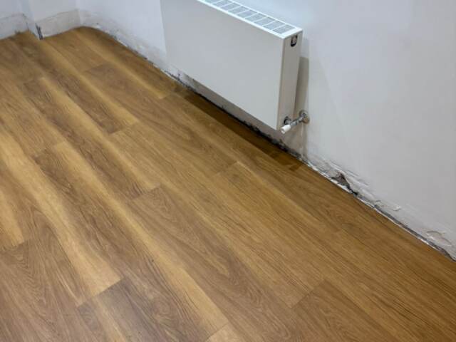 Amtico click smart honey oak installation in Kensington