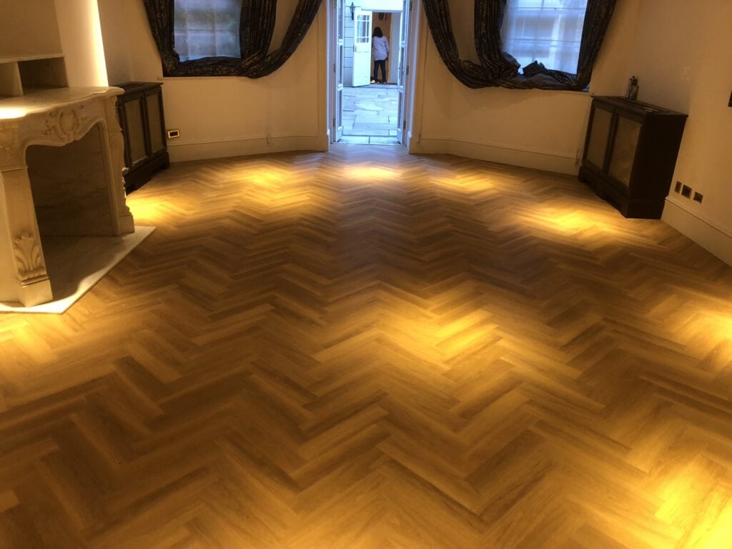 Amtico Spacia Honey Oak Fitting In Canary Wharf - Luxury Vinyl Tile (LVT) Flooring - Canary Wharf - Residential