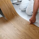 Different Types of Vinyl Flooring Explained - Cork Flooring - Laminate Flooring - Luxury Vinyl Tile (LVT) Flooring - Porcelain Tile Flooring - Vinyl Flooring - Wood Flooring