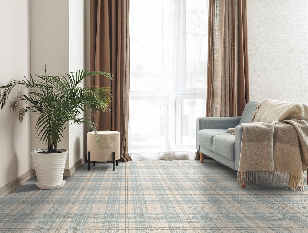 Interior of stylish living room with light curtains