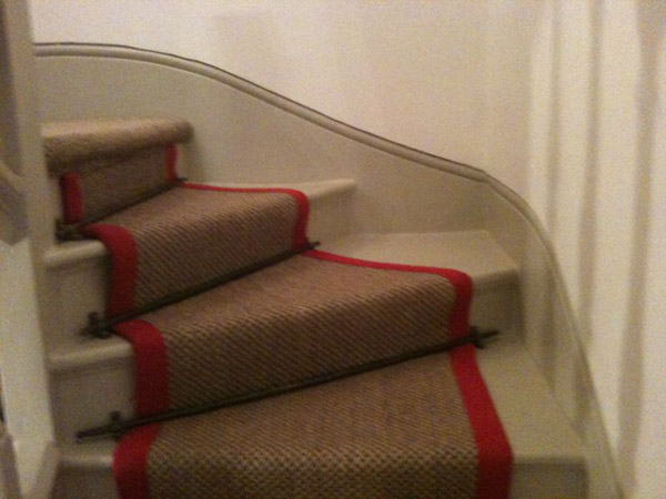 red border carpet stairs 01
