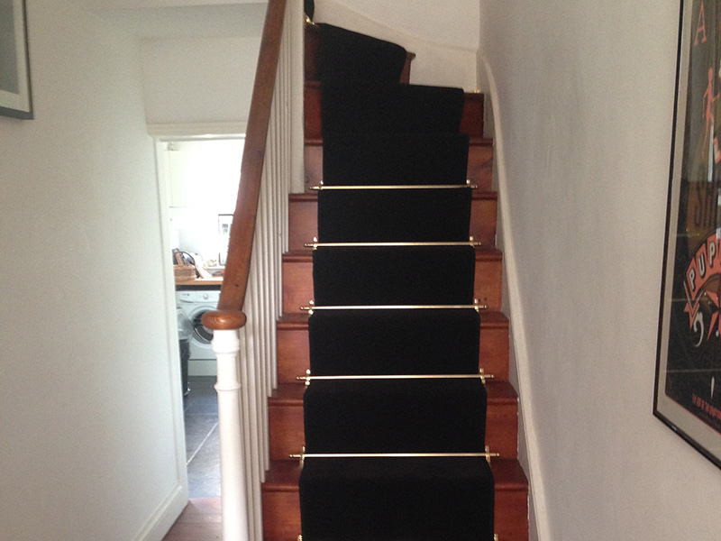 Black Carpet Runner on Stairs